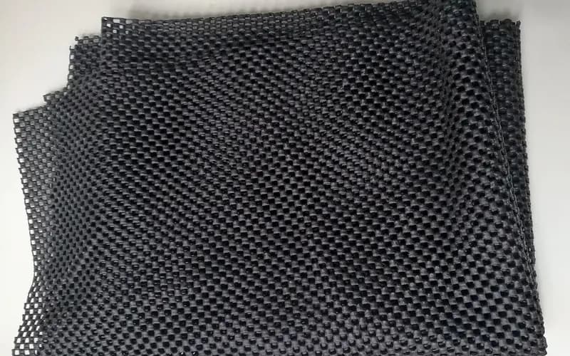 Photo of a sheet of dark non-slip grip matting. Shows the type of product, not the exact brand or model.